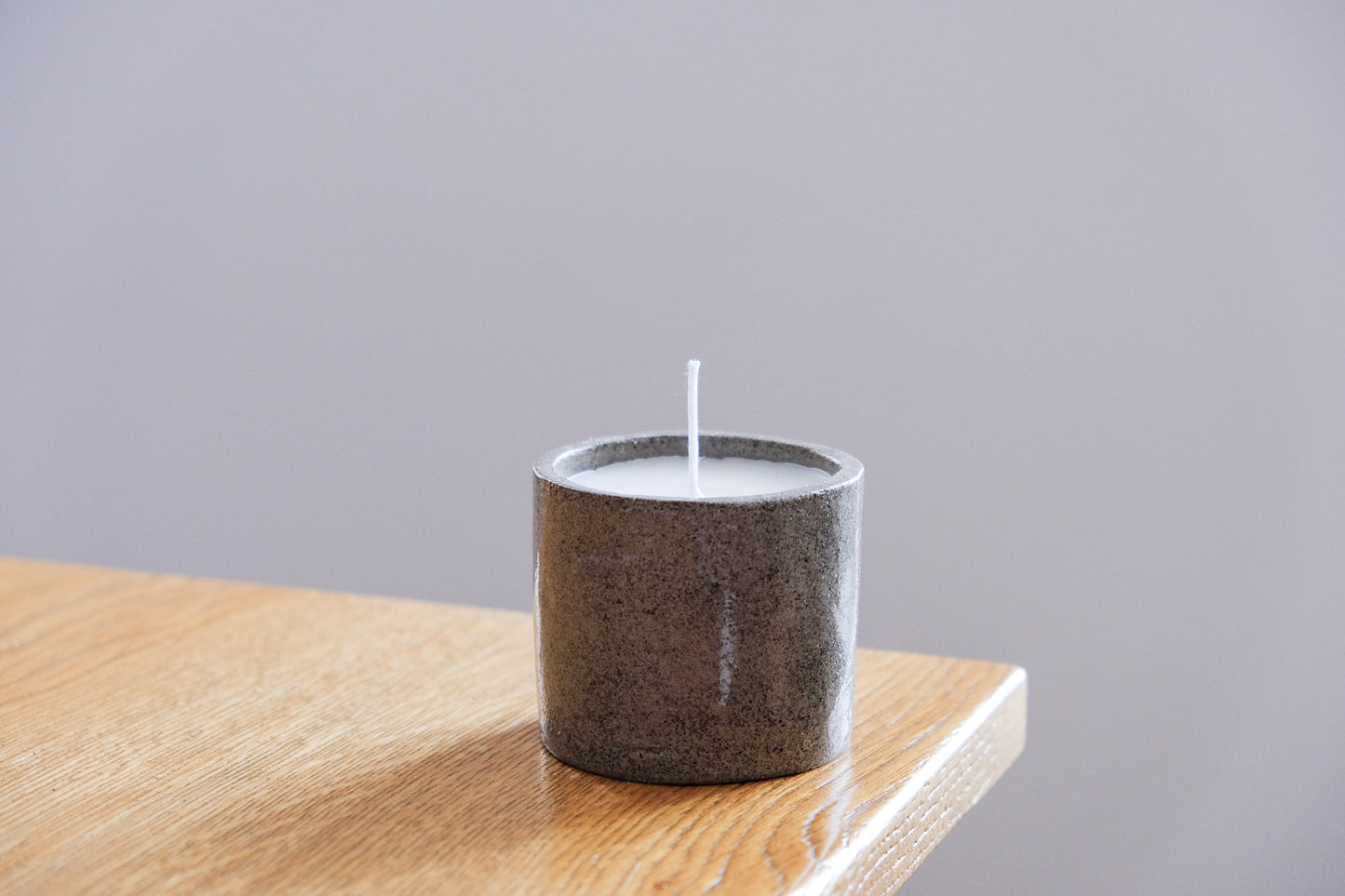 Candle in ceramic jar